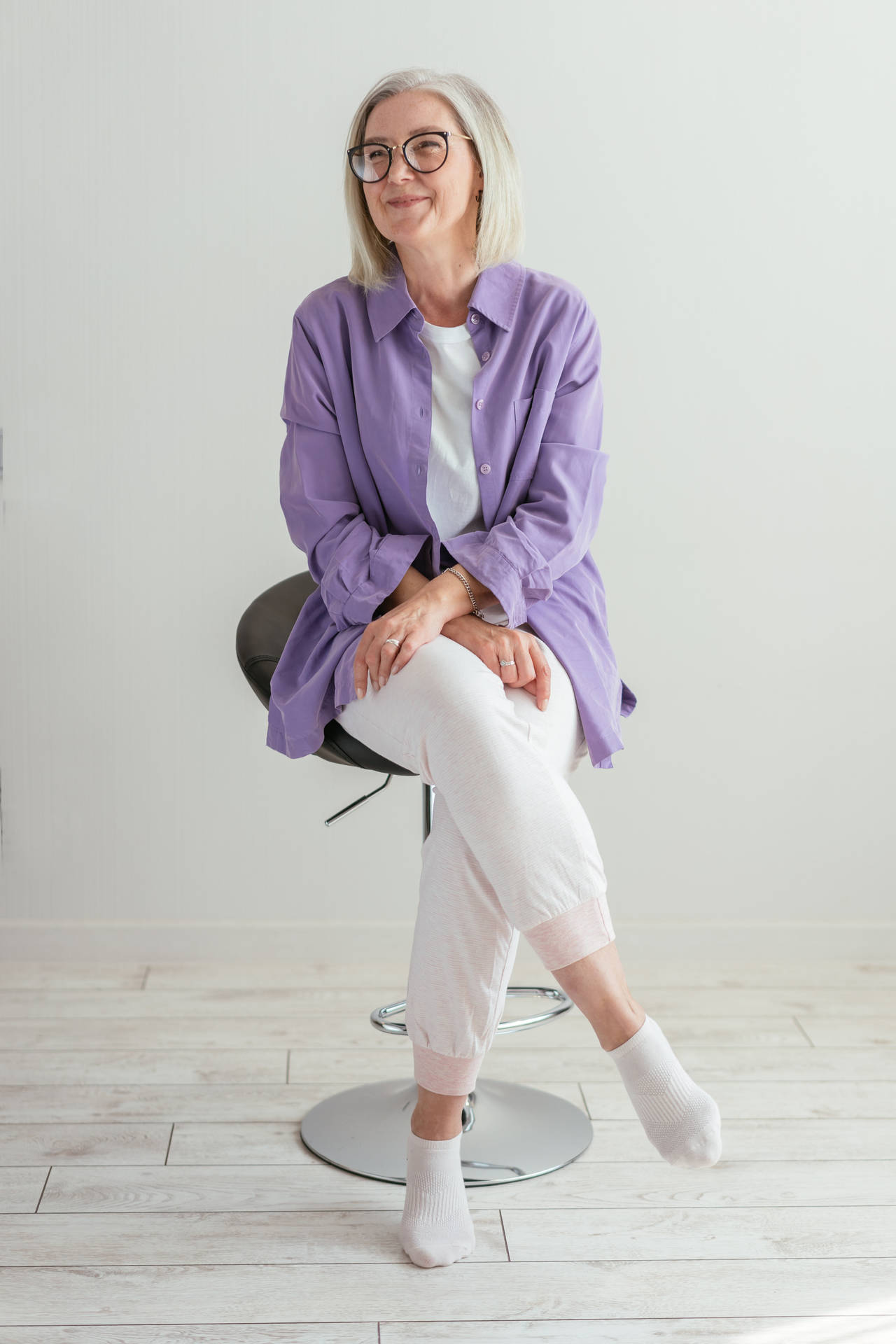 Mature Woman In A Lilac Shirt