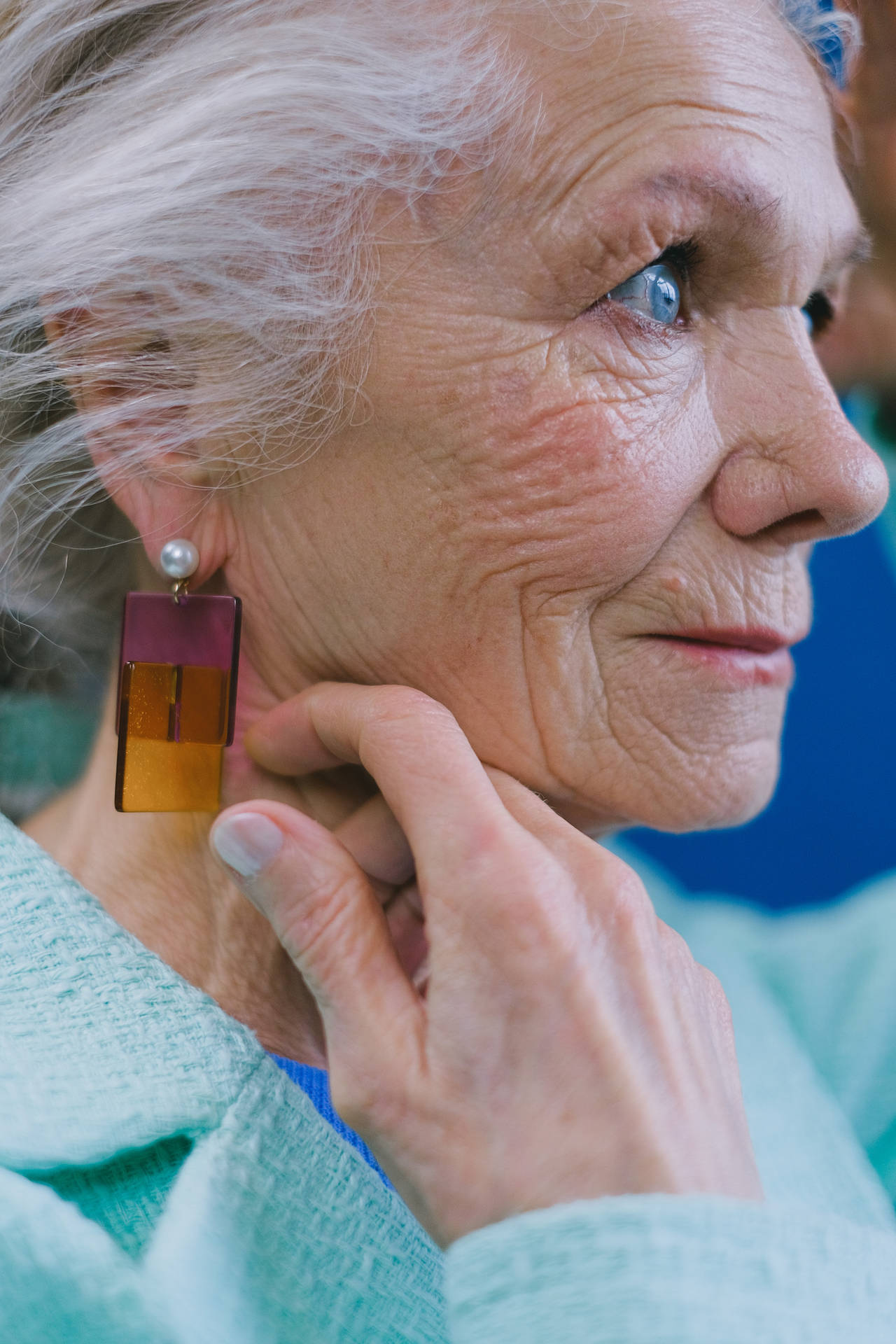 Mature Woman Modeling Earrings