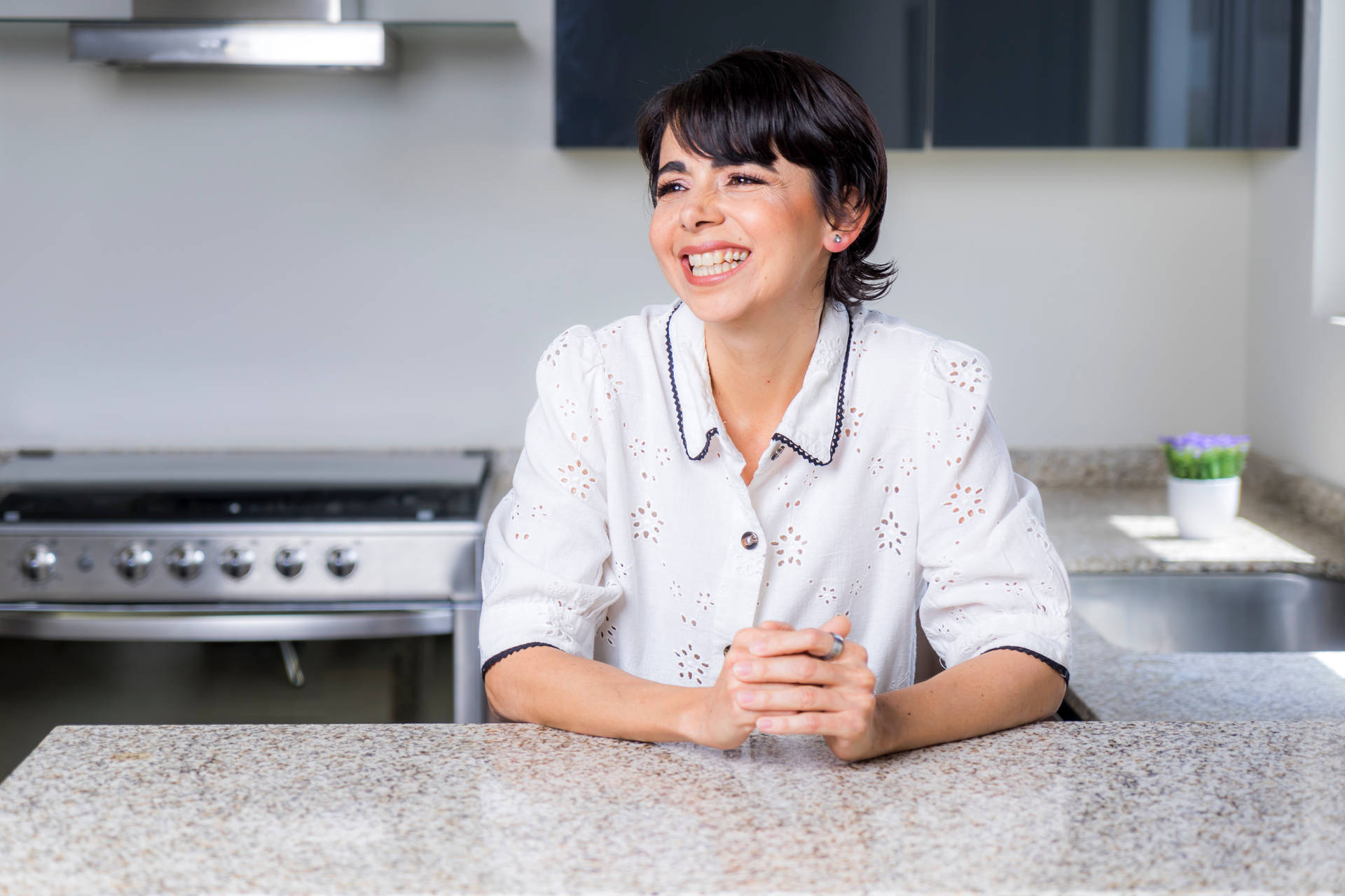 Mature Woman Posing In Her Clean Kitchen Background