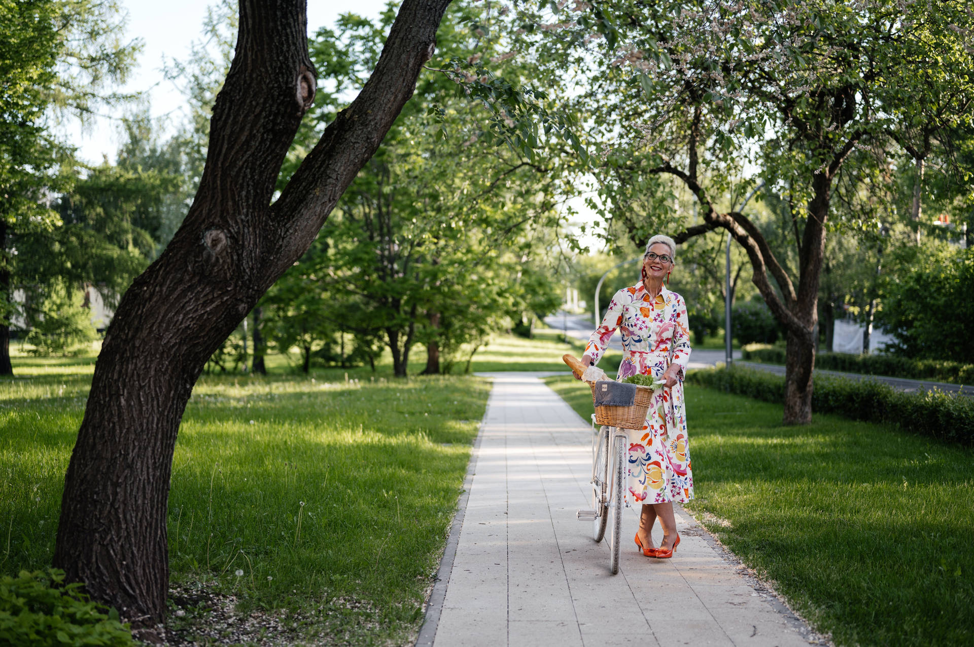 Mature Woman With Her Bicycle Background