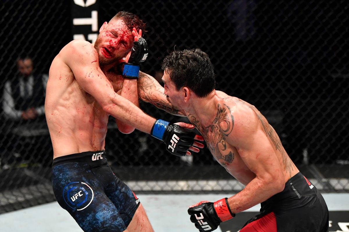 Max Holloway Attacking Bloody Opponent Background