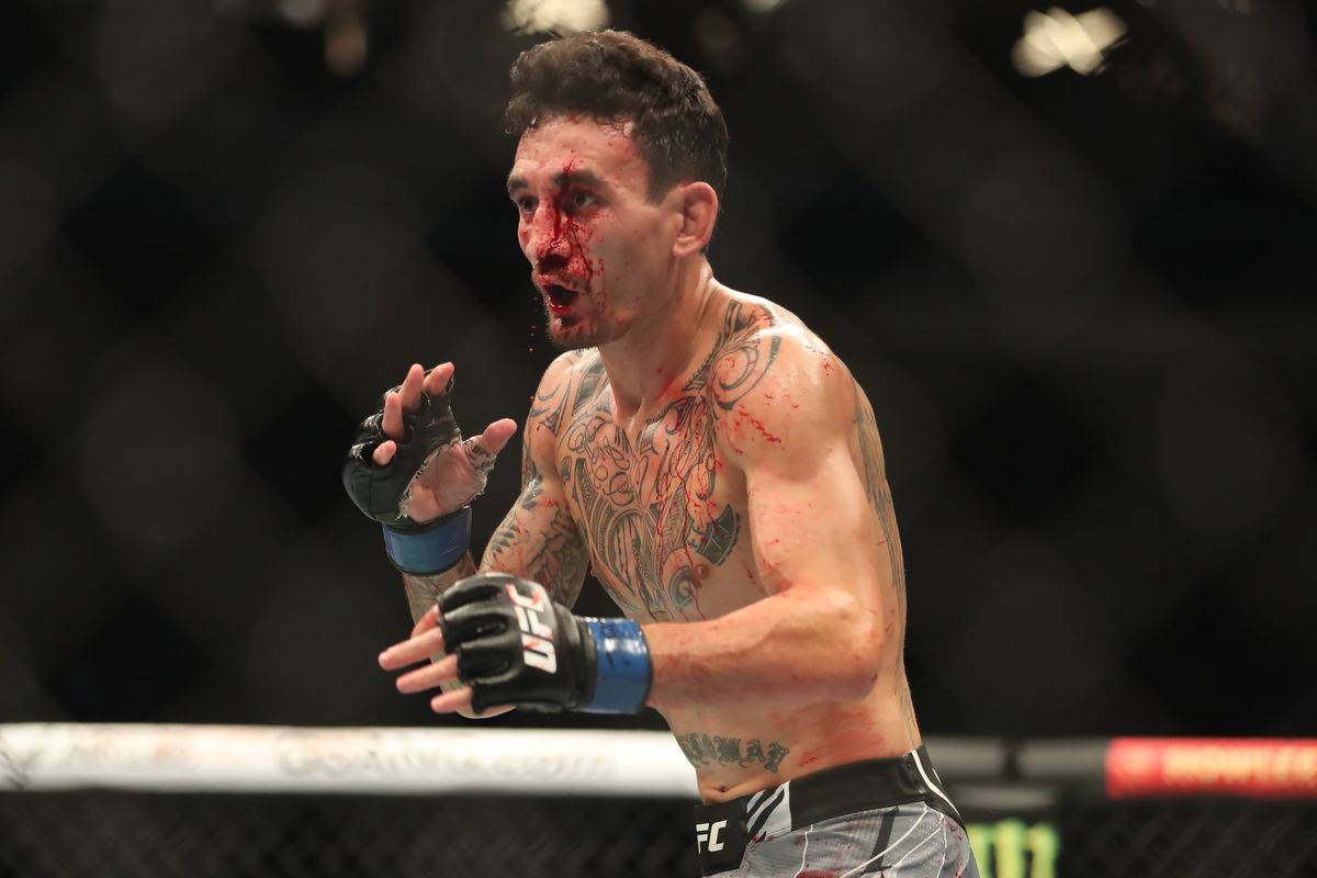 Max Holloway Fighting Bloody Face Background