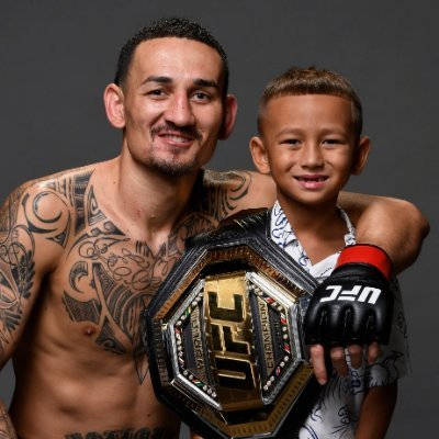 Max Holloway Holding Son And Belt