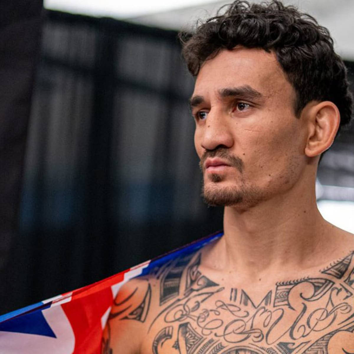 Max Holloway Shoulder Tattoos Flag Background