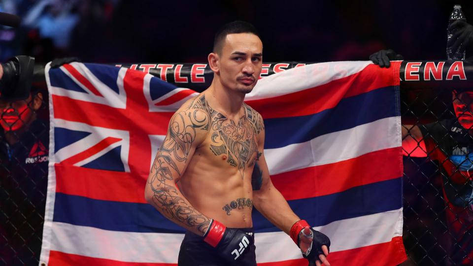 Max Holloway Walking Near Hawaiian Flag