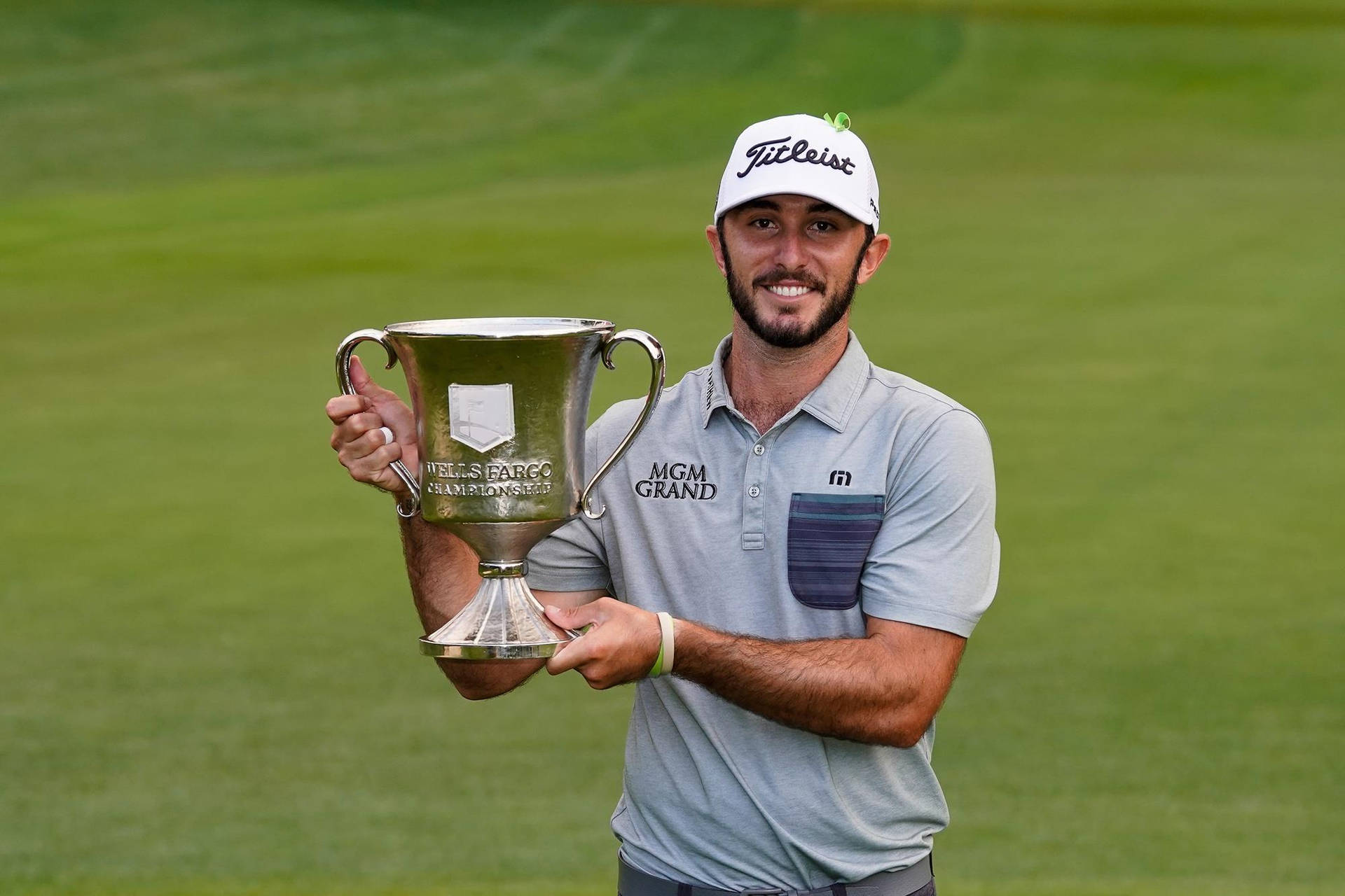 Max Homa Holding Wells Fargo Championship Trophy