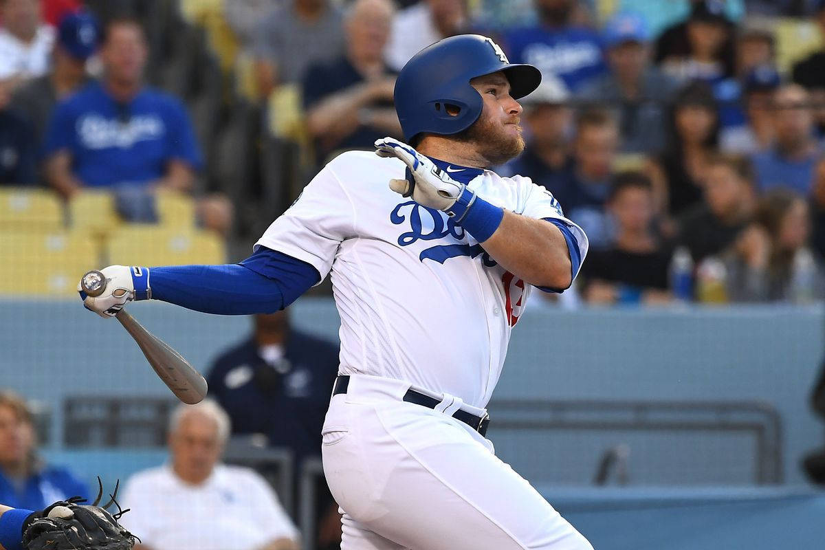 Max Muncy Looking Up With Bat Background