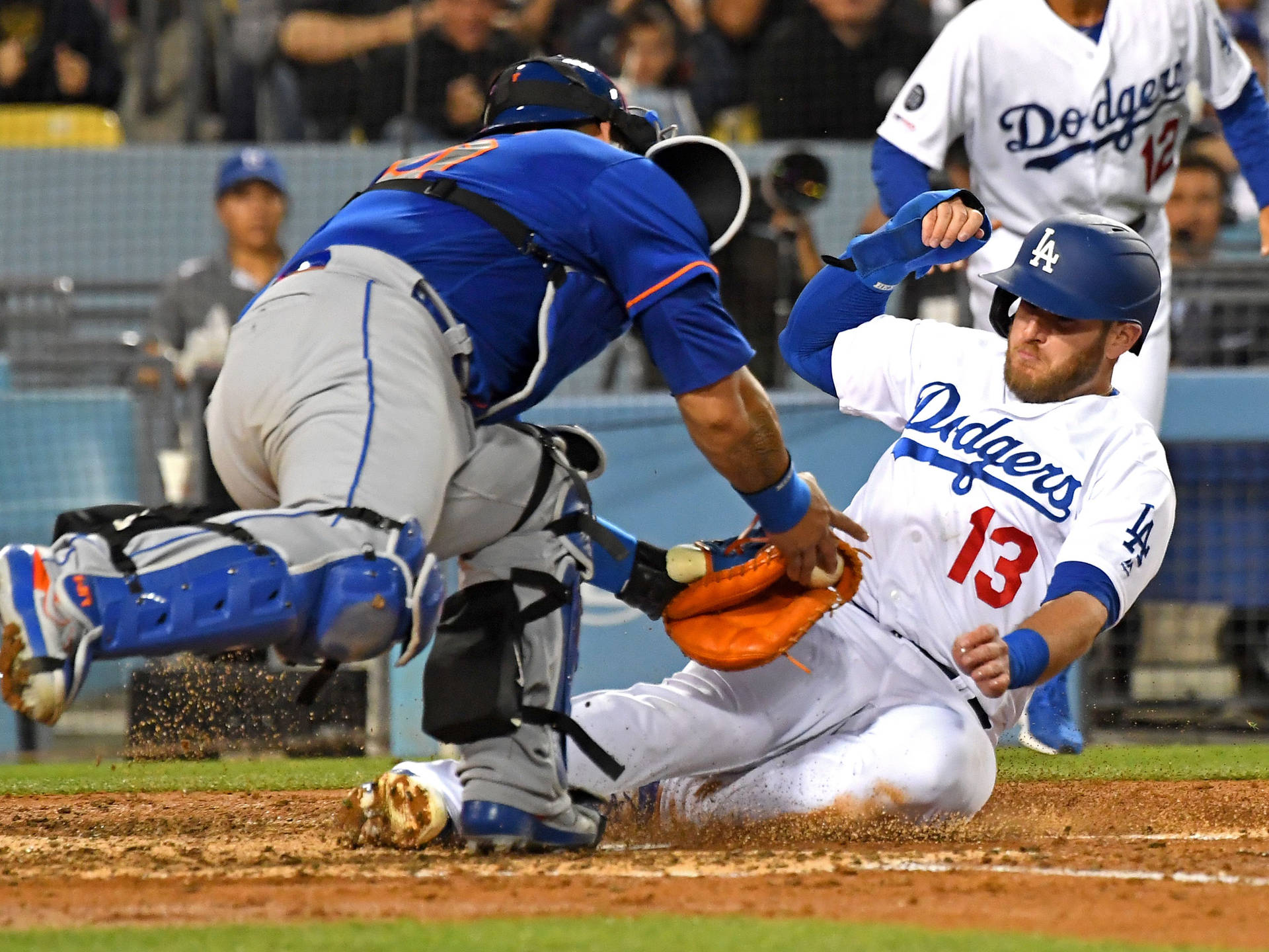 Max Muncy Sliding Towards Base