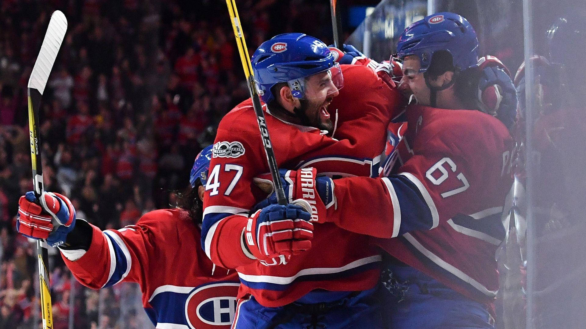 Max Pacioretty Celebrating With Teammates Background