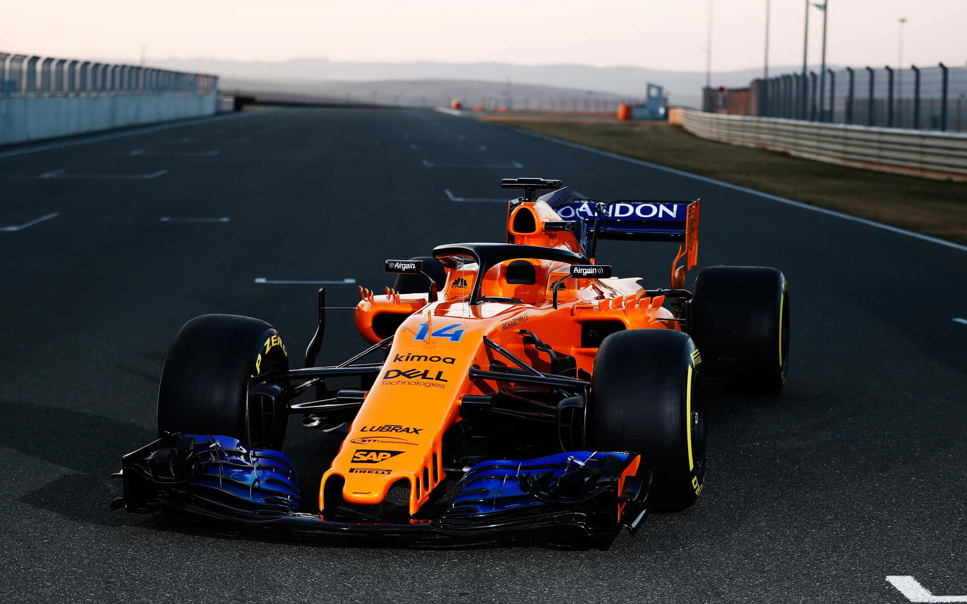 Max Verstappen Driving His Mclaren F1 Car Background