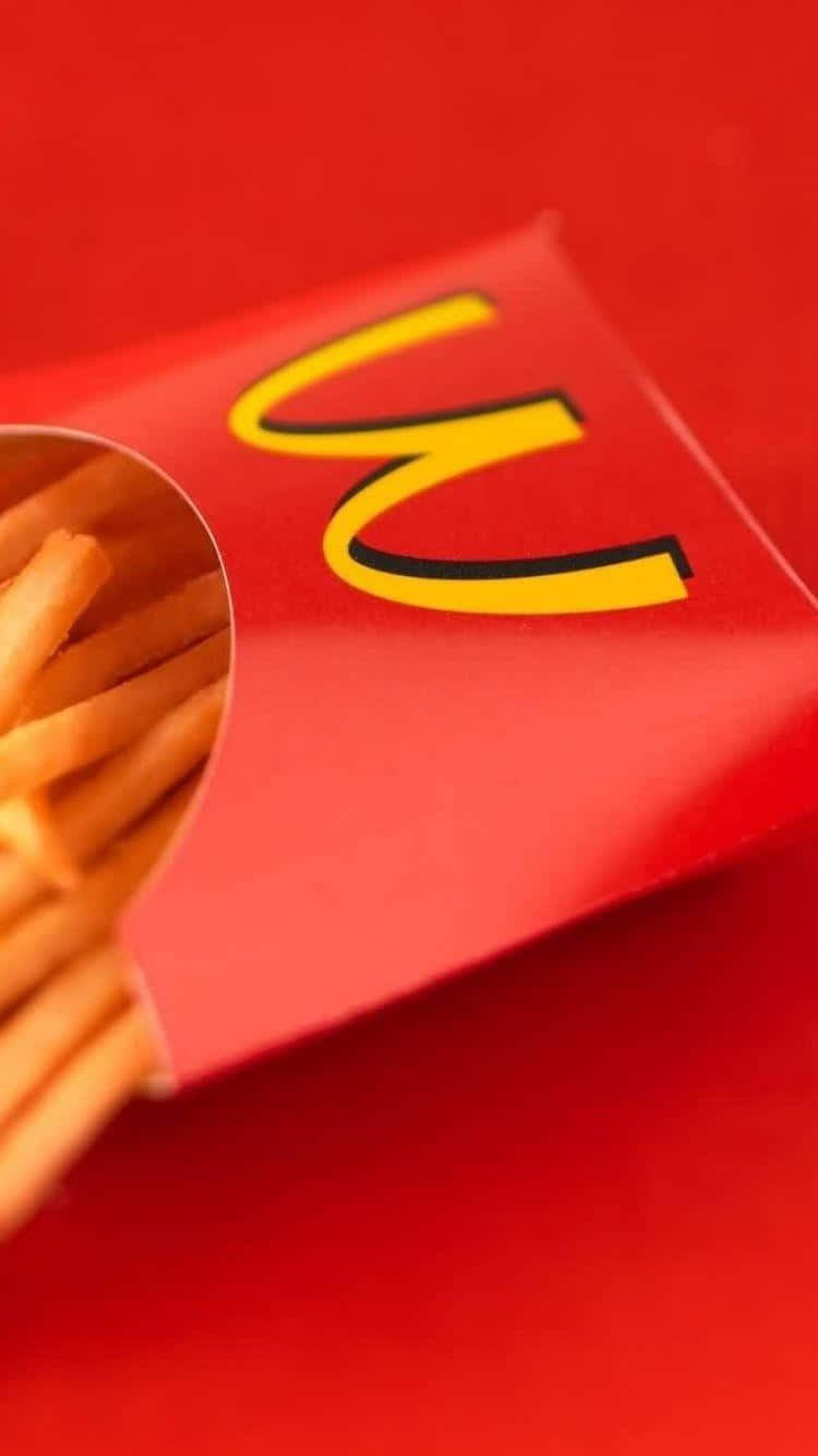 Mcdonald's French Fries In A Red Box Background