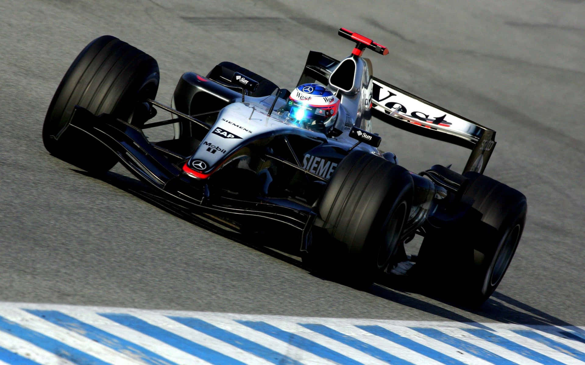 Mclaren Formula 1 Team Leading The Race Background