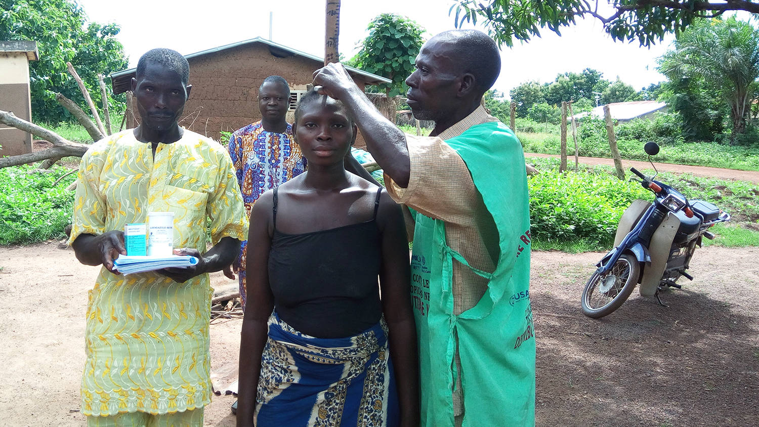 Medical Missionaries In Action At Benin Background