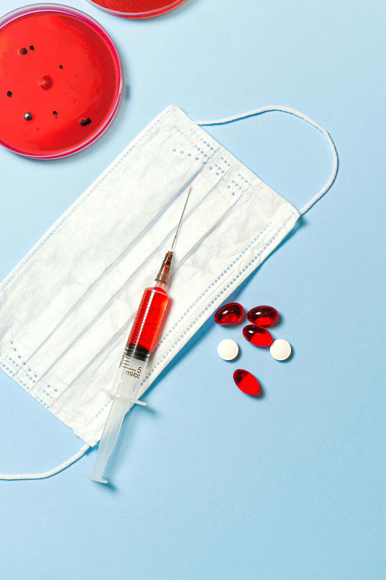 Medical Supplies Redand Whiteon Blue Background Background