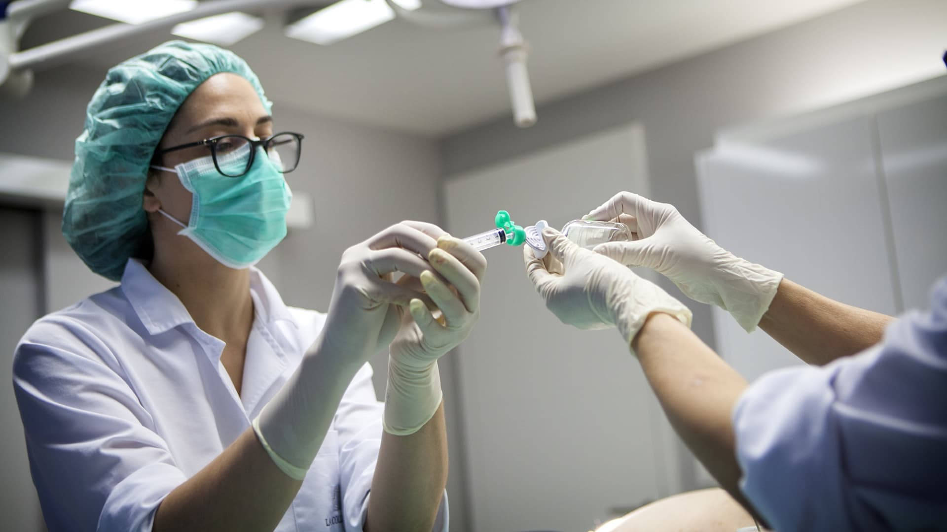 Medical Surgeon Using Syringe Background