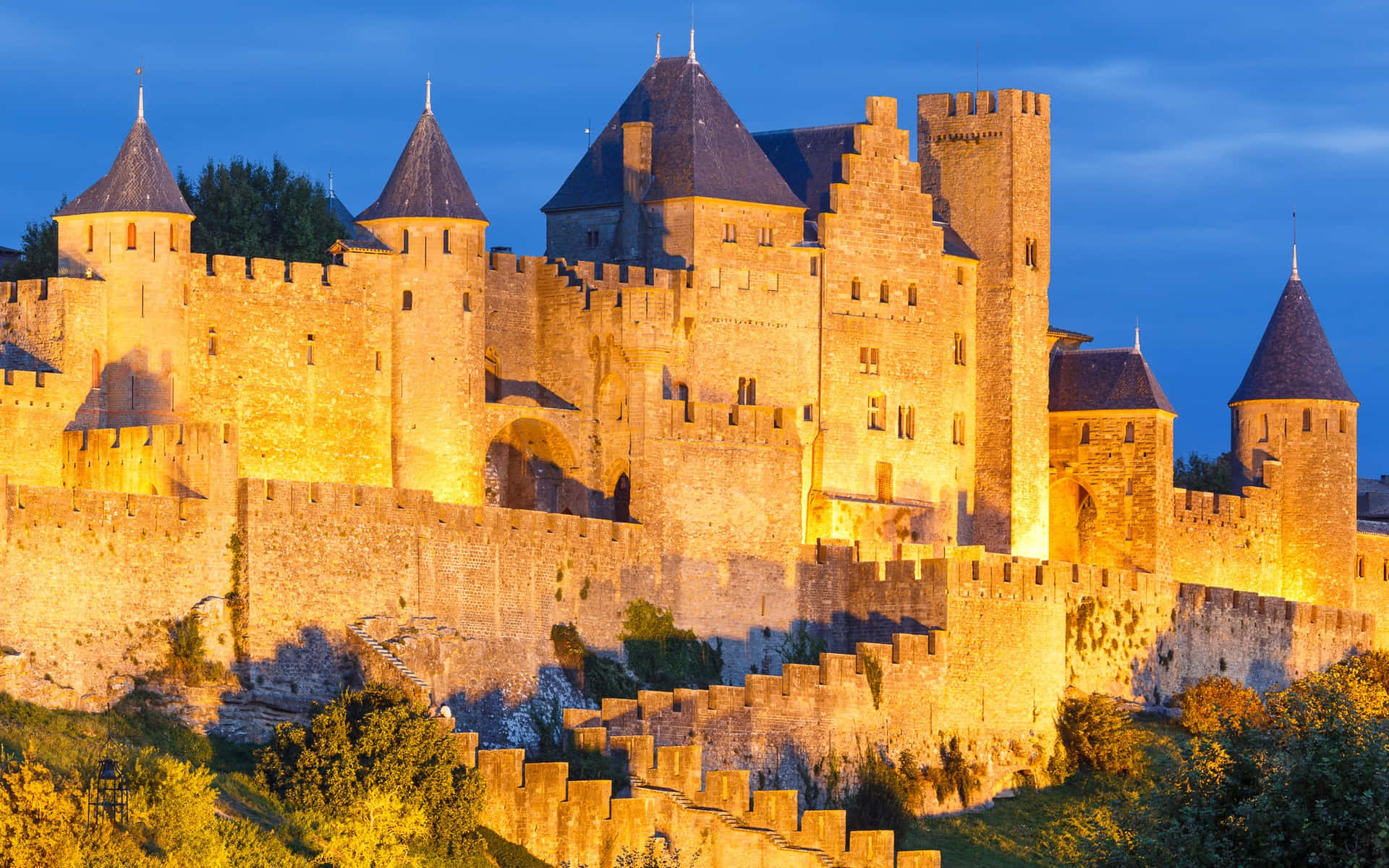 Medieval Chateau Comtal In Carcassonne Golden Hour Background