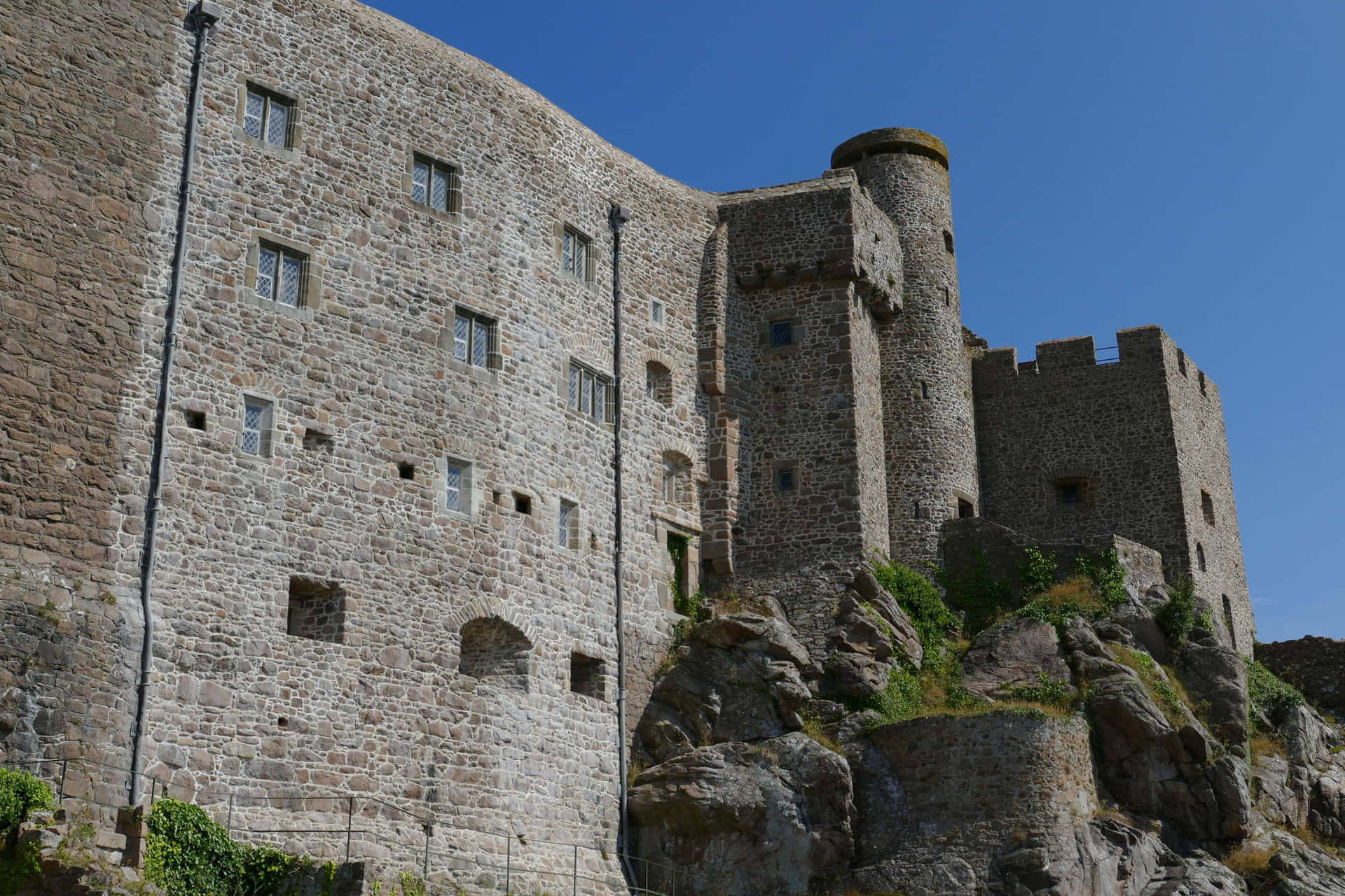 Medieval Stone Castleon Rocky Hill Background