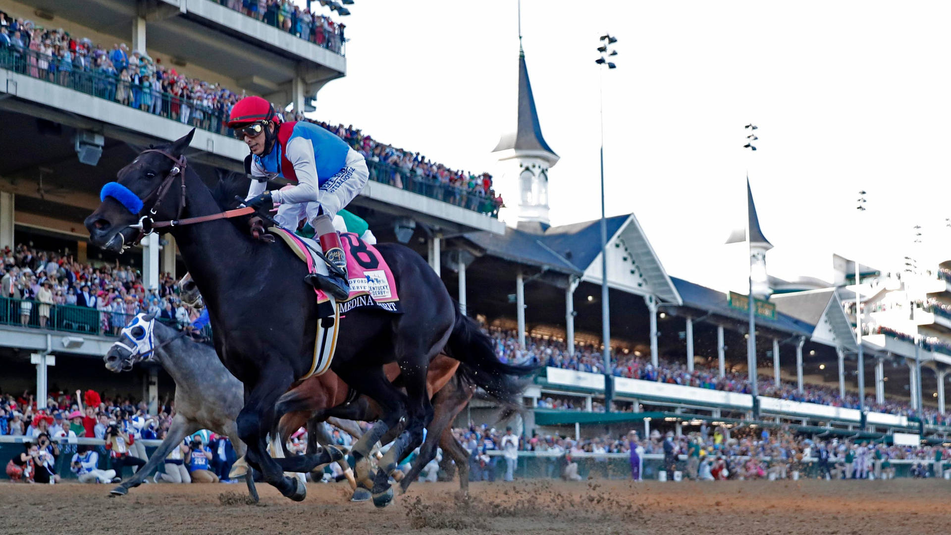 Medina Spirit Storming Towards Victory At The Kentucky Derby Background