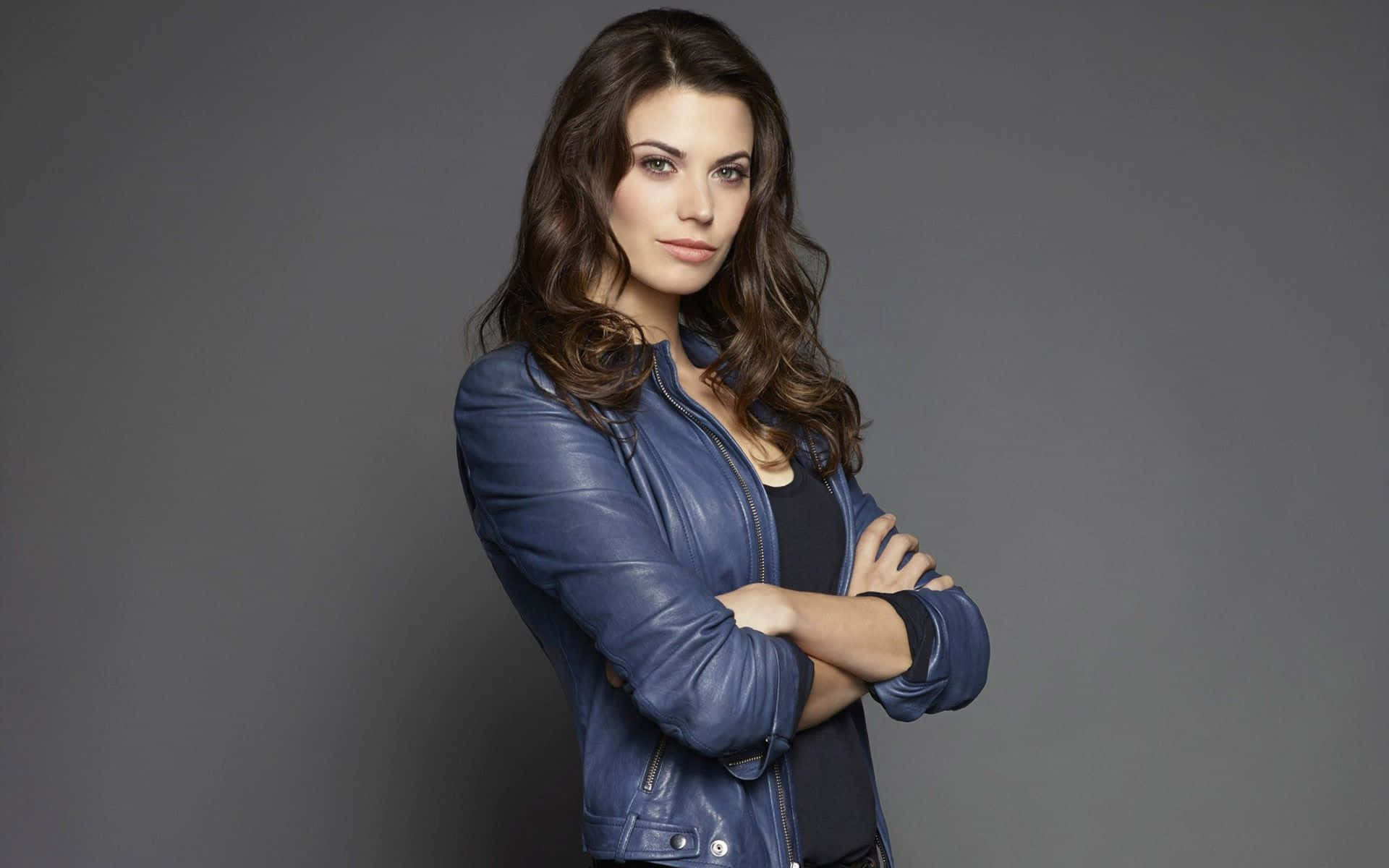 Meghan Ory Confident Pose Background