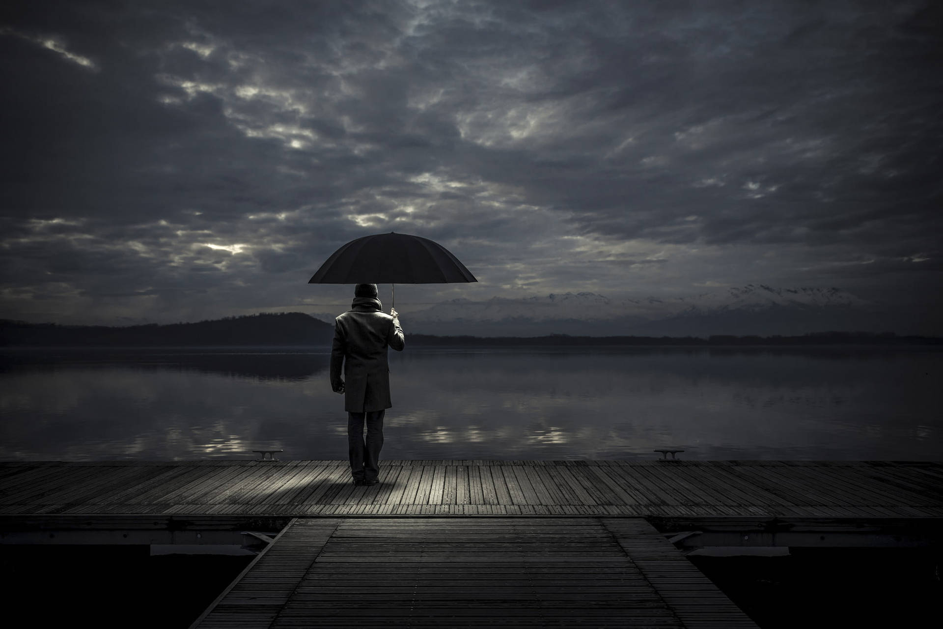 Melancholy Man Reflecting On Life At The Docks Background