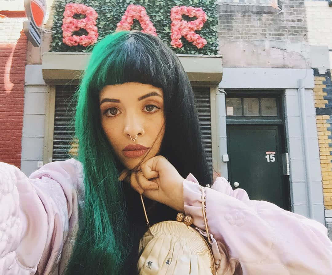 Melanie Martinez Aesthetic Looks Background