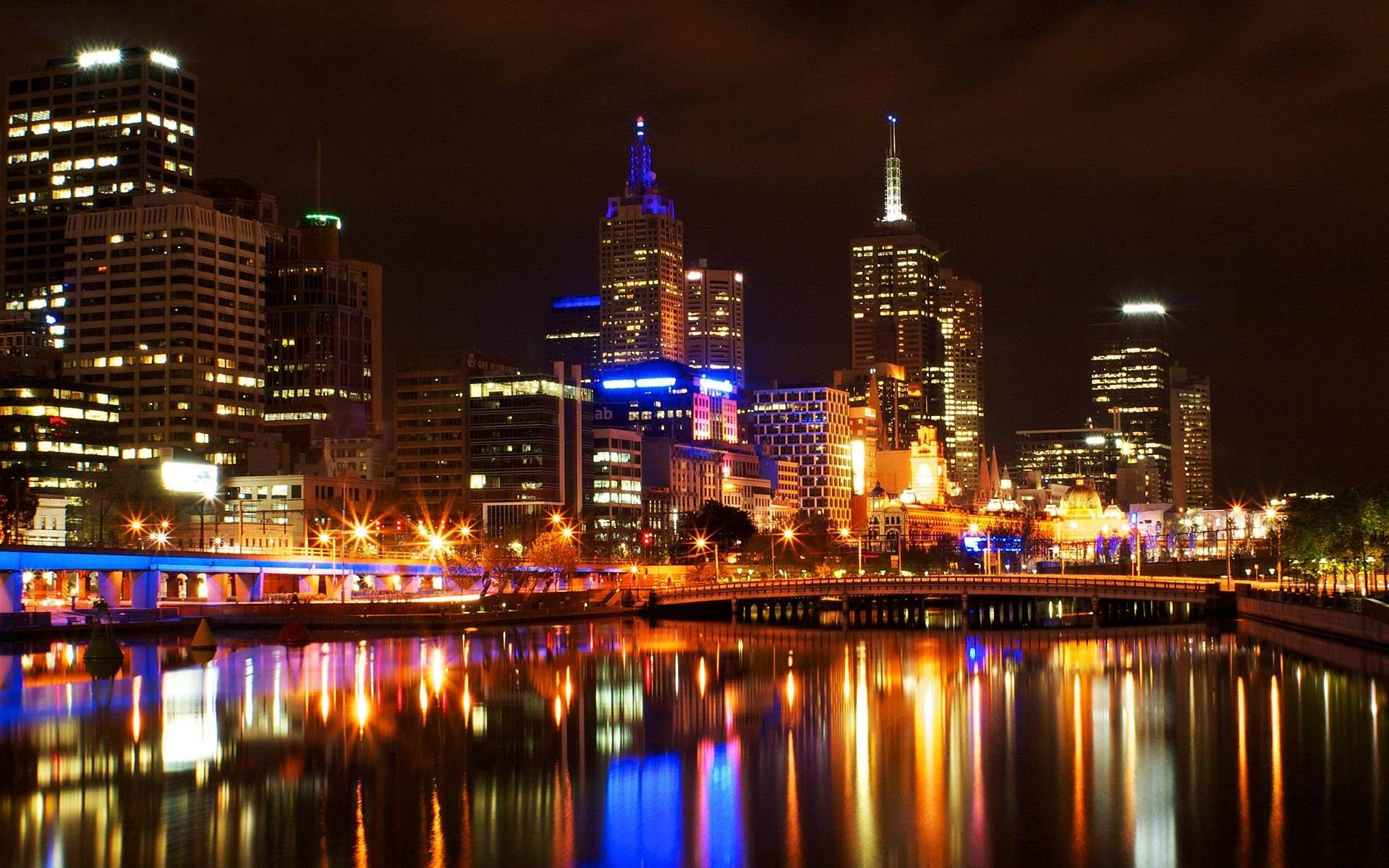 Melbourne Buildings With Lights Background