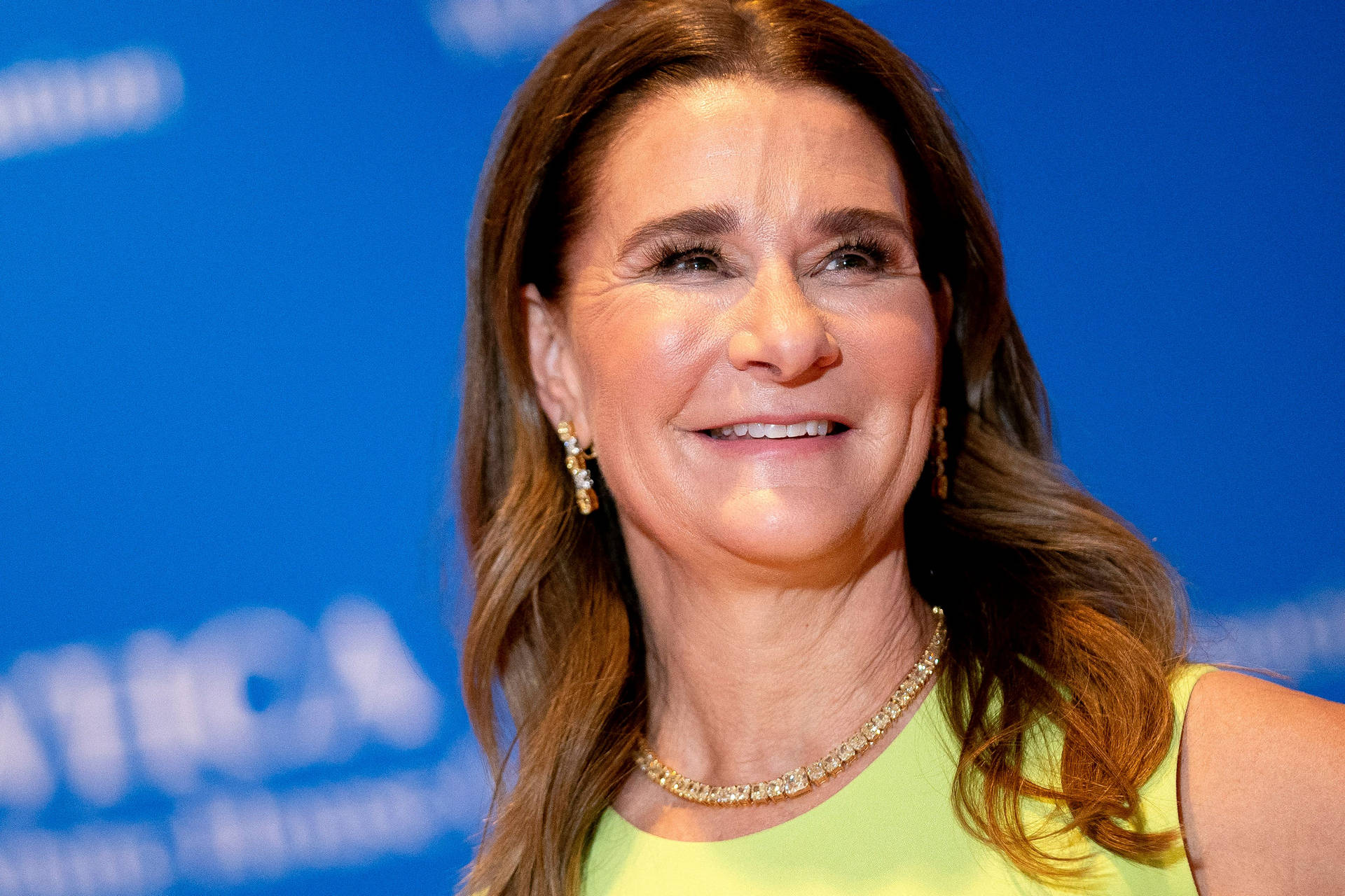 Melinda French Gates All Smiles Wearing Yellow Background