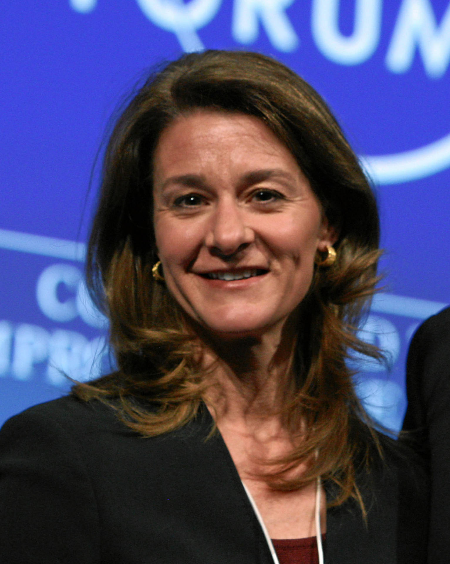 Melinda French Gates In A Black Blazer Background