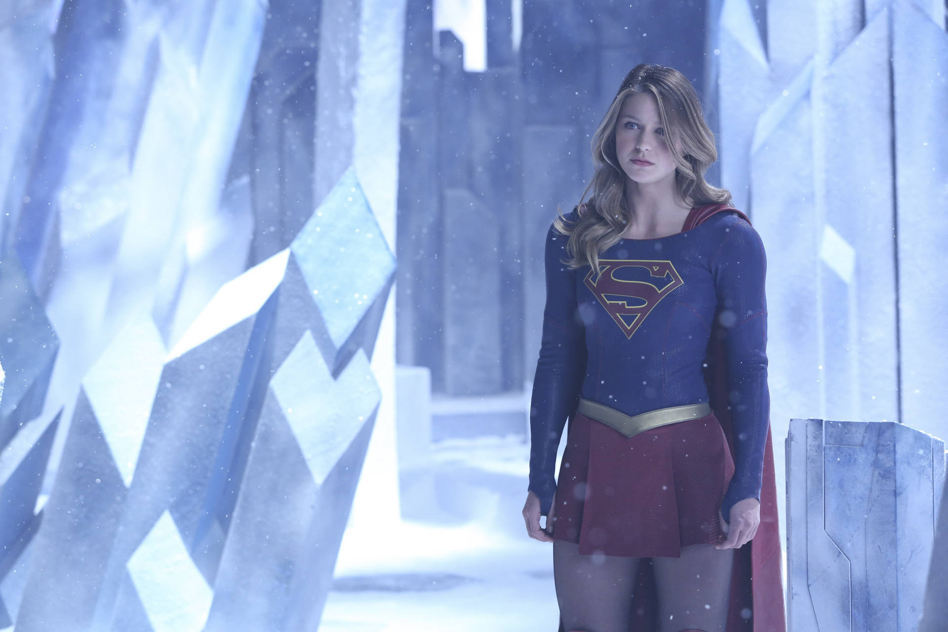 Melissa Benoist In Superhero Attire, Showcasing Her Role As Supergirl. Background