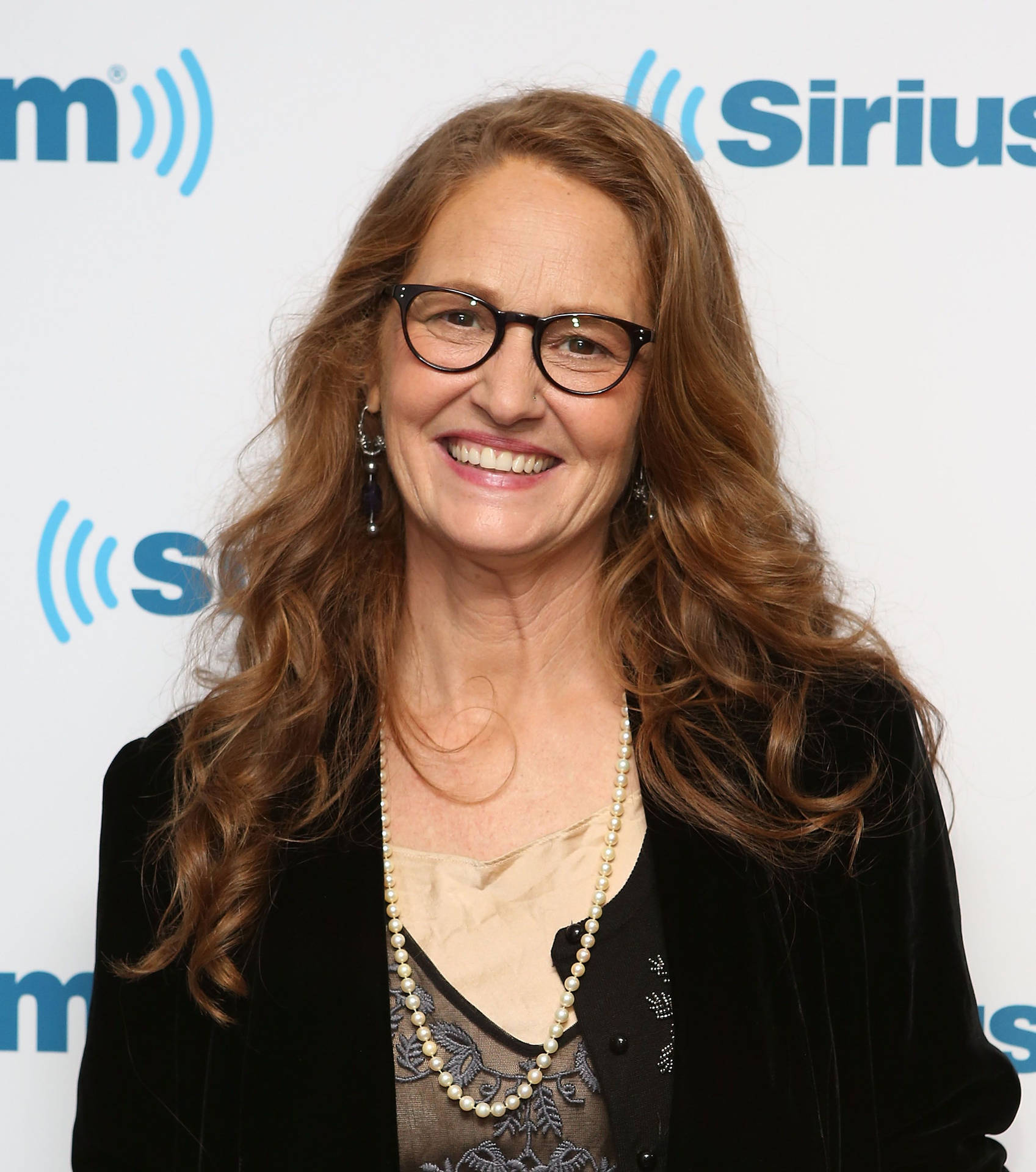 Melissa Leo Actress Smile With Spectacles Background