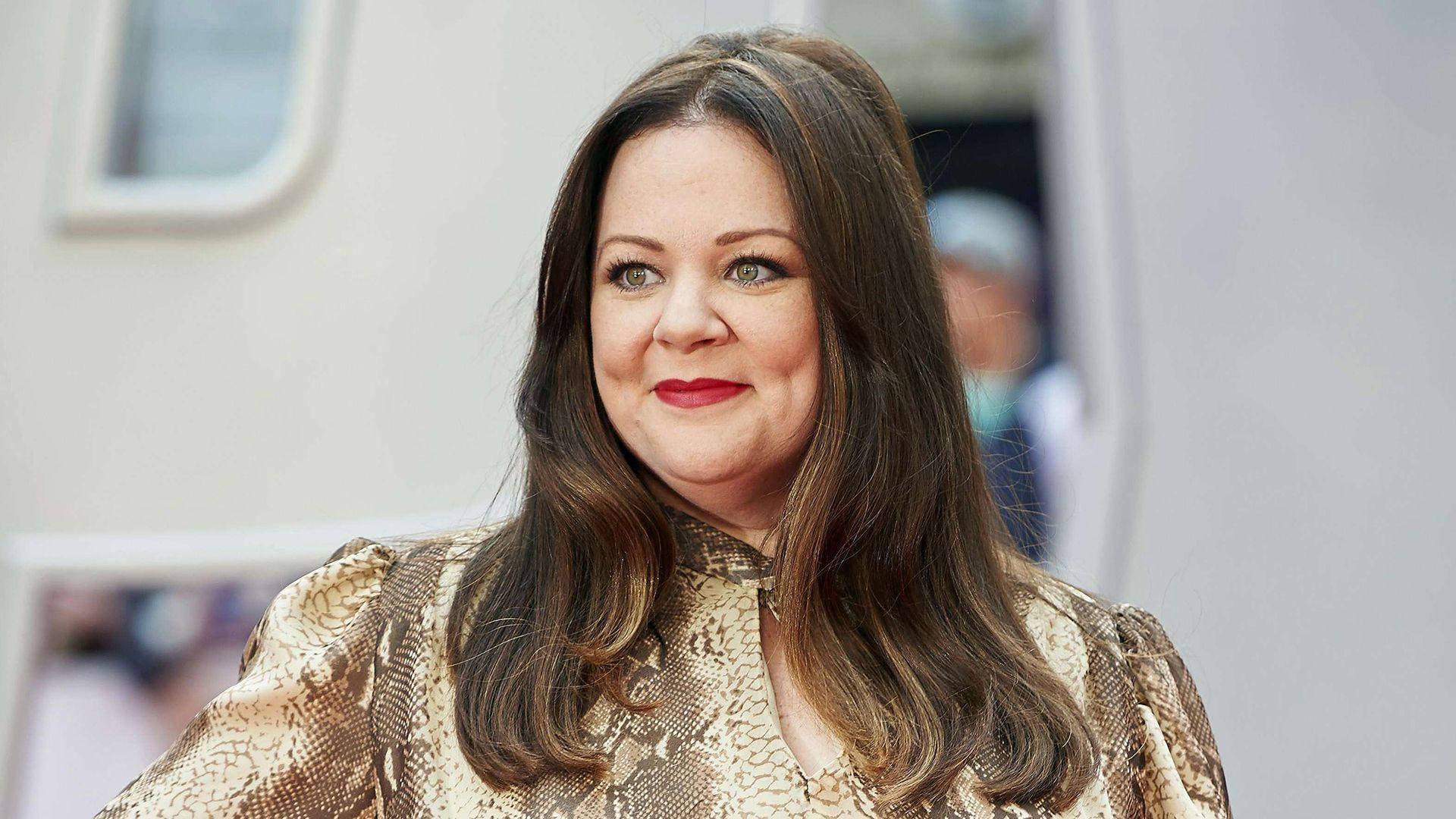 Melissa Mccarthy Graces The European Premiere Of The Spy Movie. Background