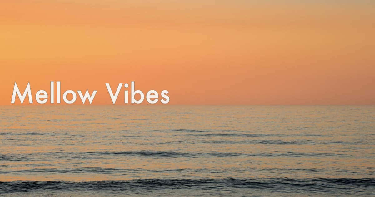 Mellow Vibes Text On A Beach Sunset Photo