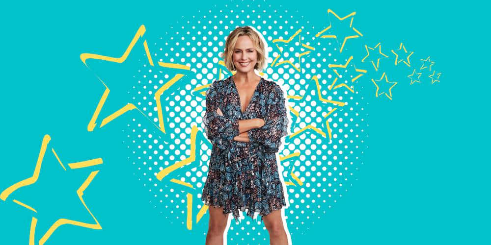 Melora Hardin Stylish Pose Against Blue Background Background
