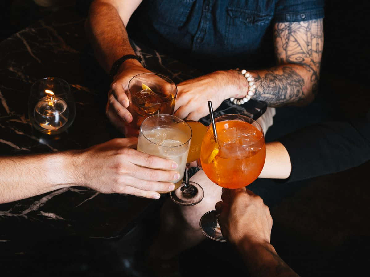 Men Clinking Glasses Of Drinks Background