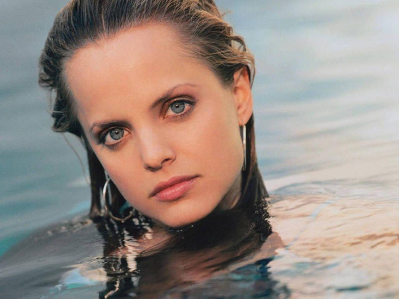 Mena Suvari On Water Background