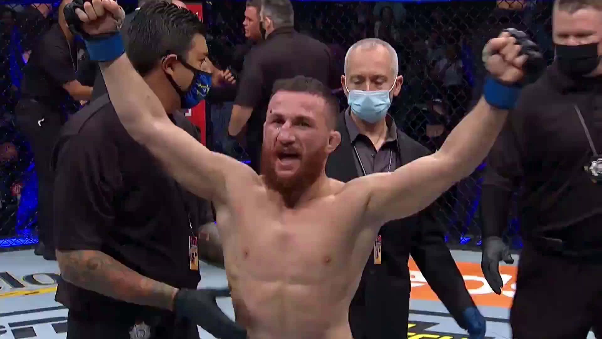 Merab Dvalishvili Celebratory Fist Pumps Background