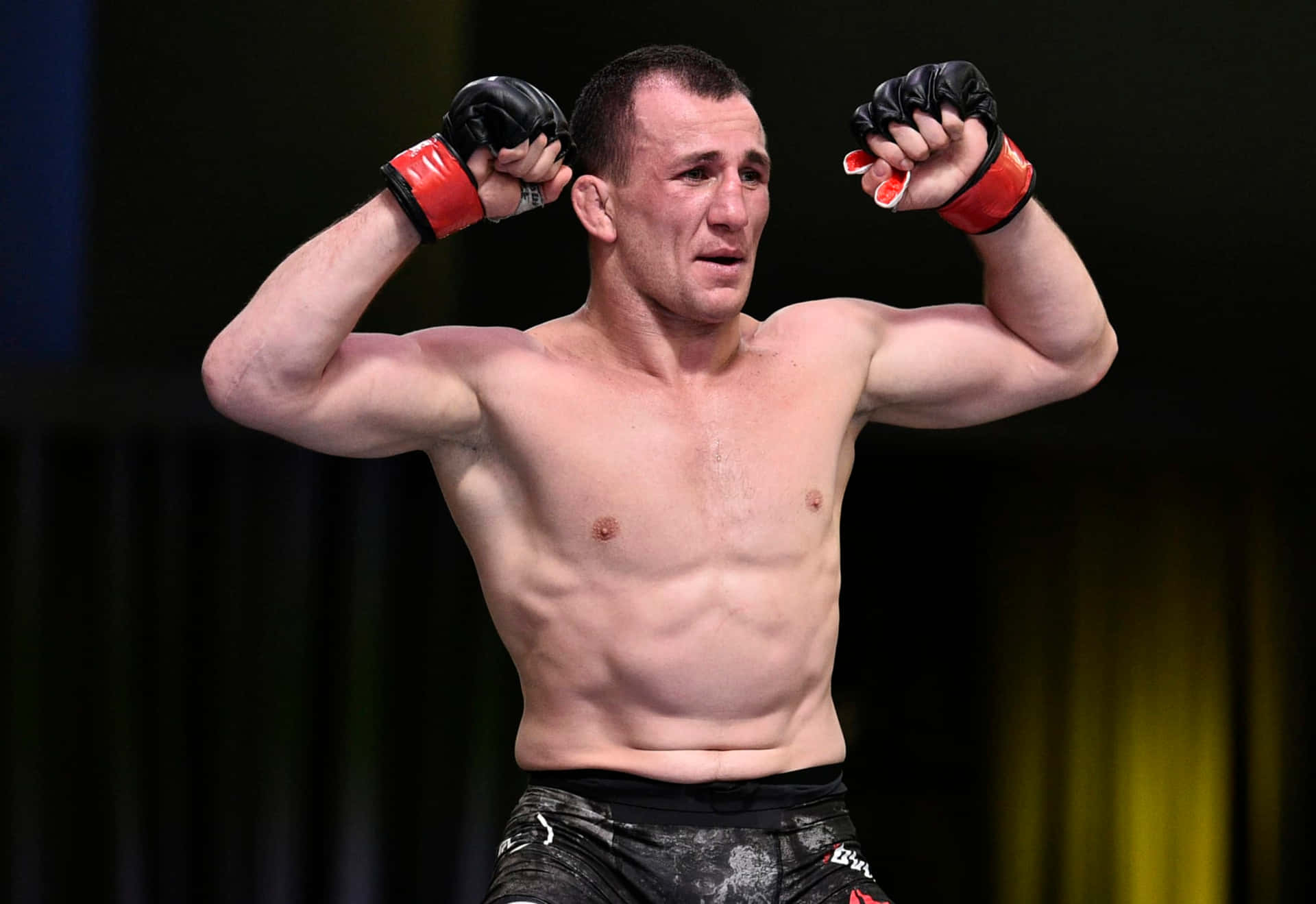 Merab Dvalishvili Displaying His Robust Physique Background