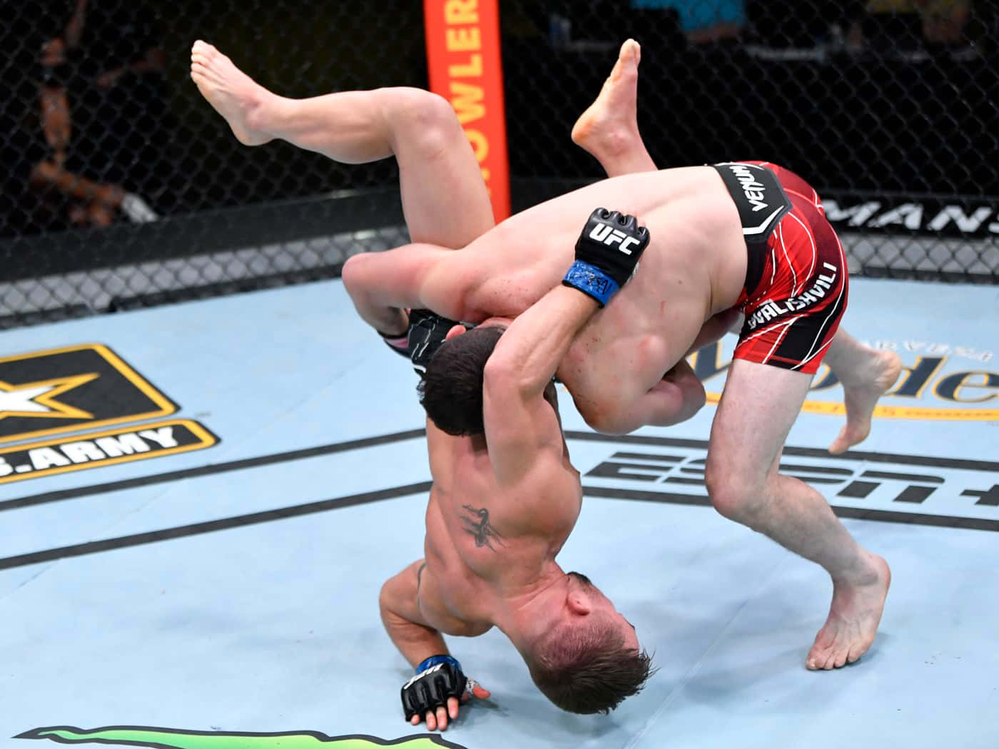 Merab Dvalishvili Tackling To The Ground Background