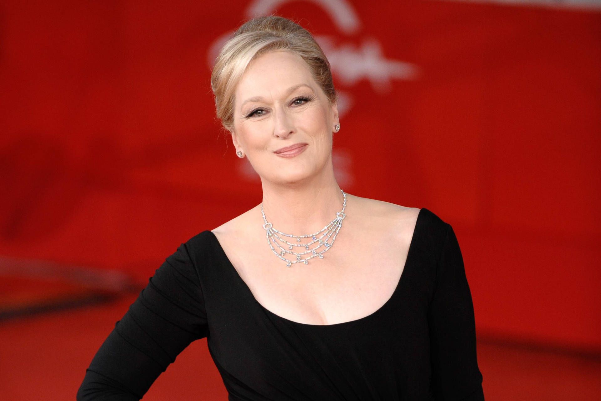 Meryl Streep On A Red Backdrop Background