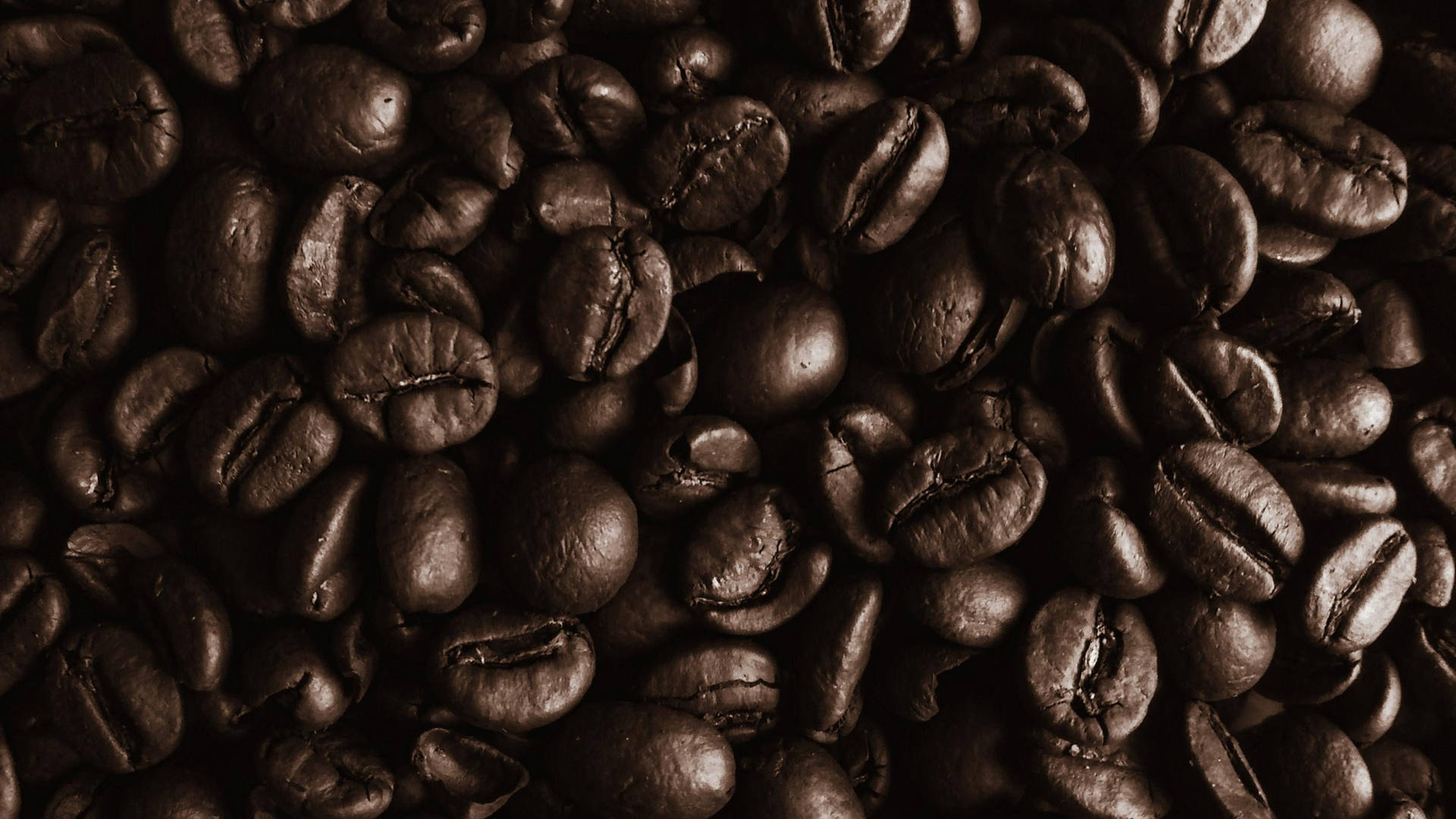 Mesmerizing Aroma Of Dark Roasted Coffee Beans Background