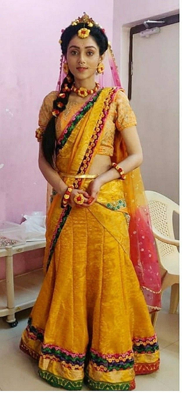 Mesmerizing Mallika Singh In An Elegant Orange Dress