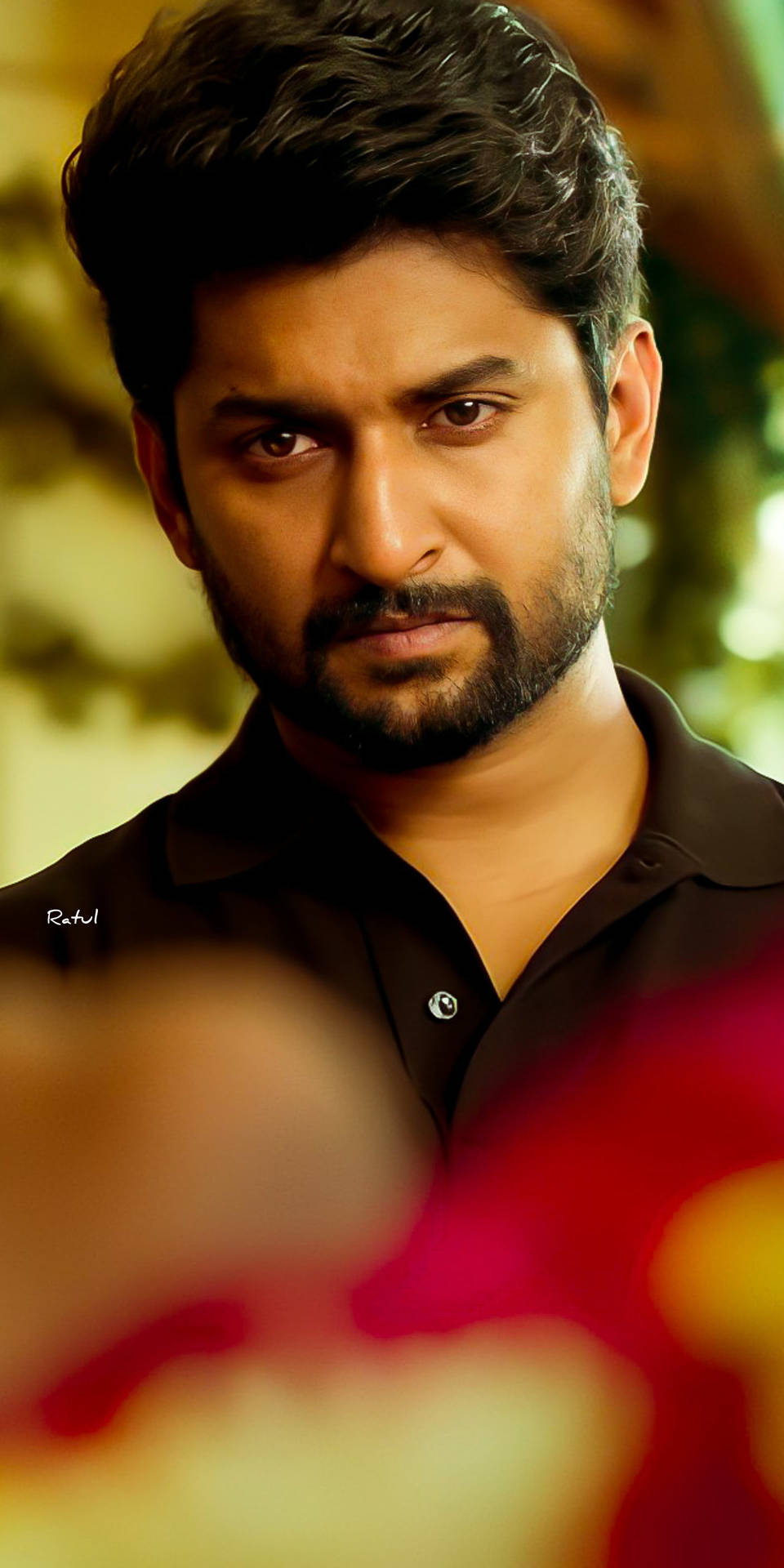 Mesmerizing Serious Look Of Actor Nani Background