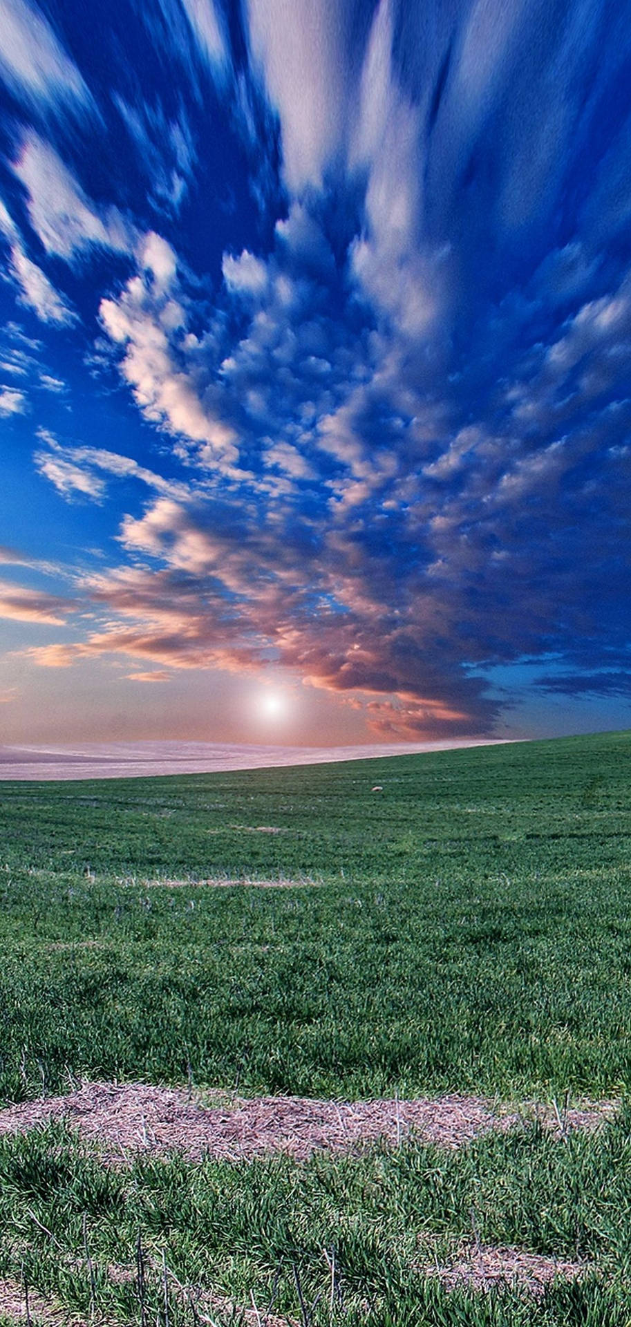 Mesmerizing Sunset Above The Horizon Background