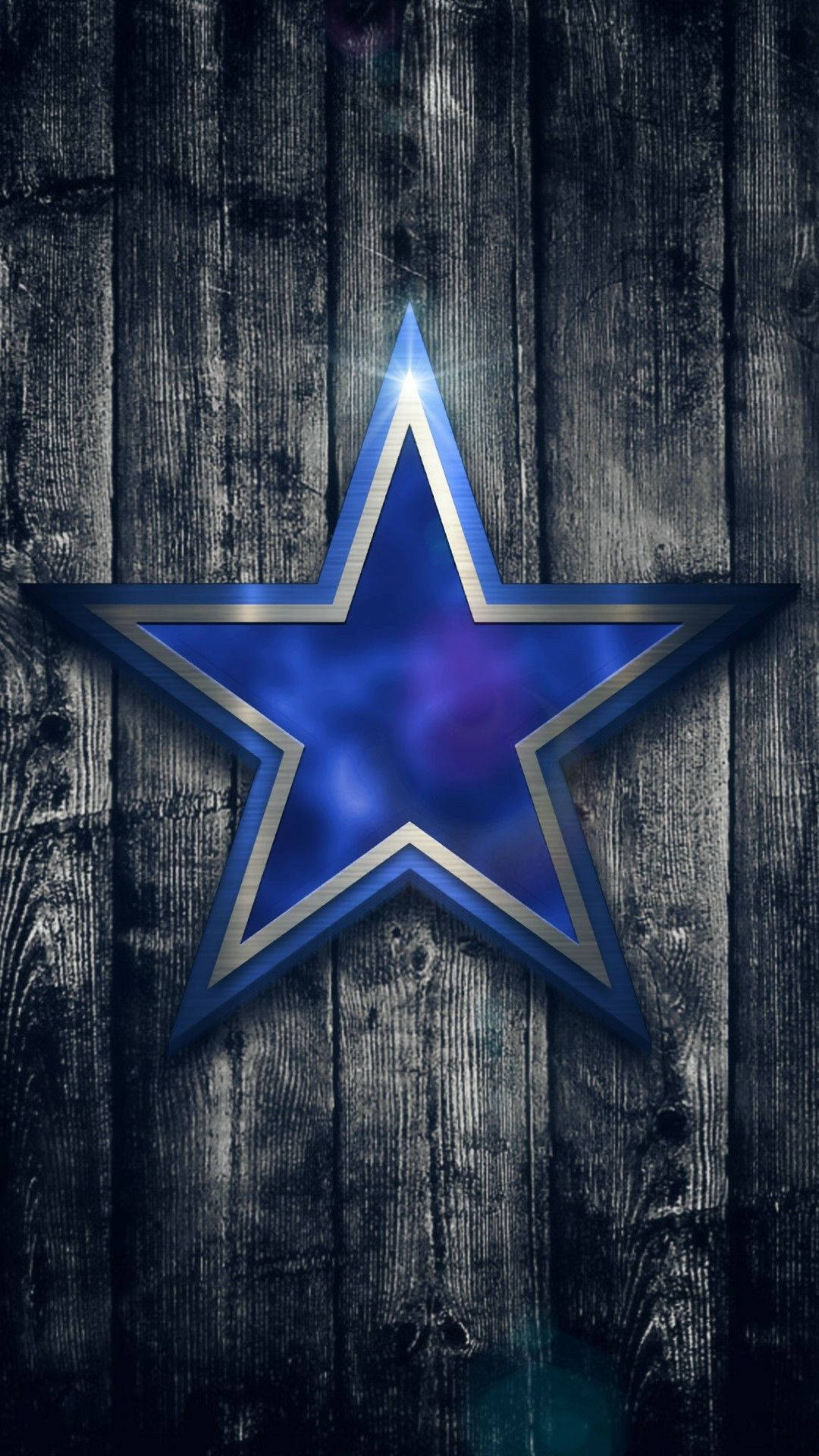 Metal Dallas Cowboys Logo On Wood Background Background