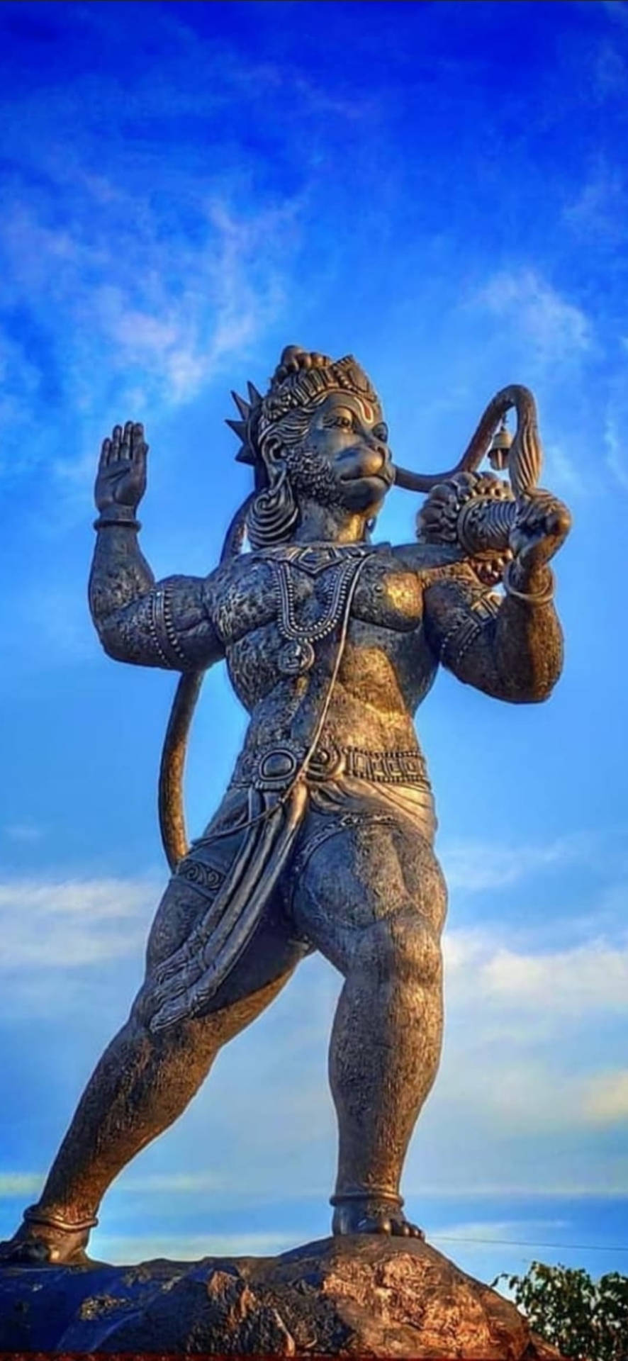 Metallic God Hanuman Statue Background