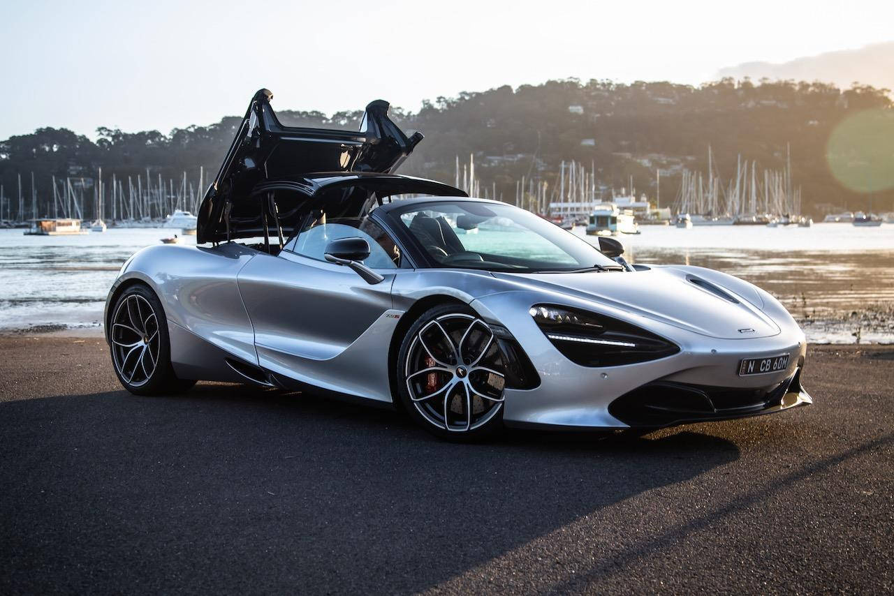 Metallic Silver Mclaren Spyder Background