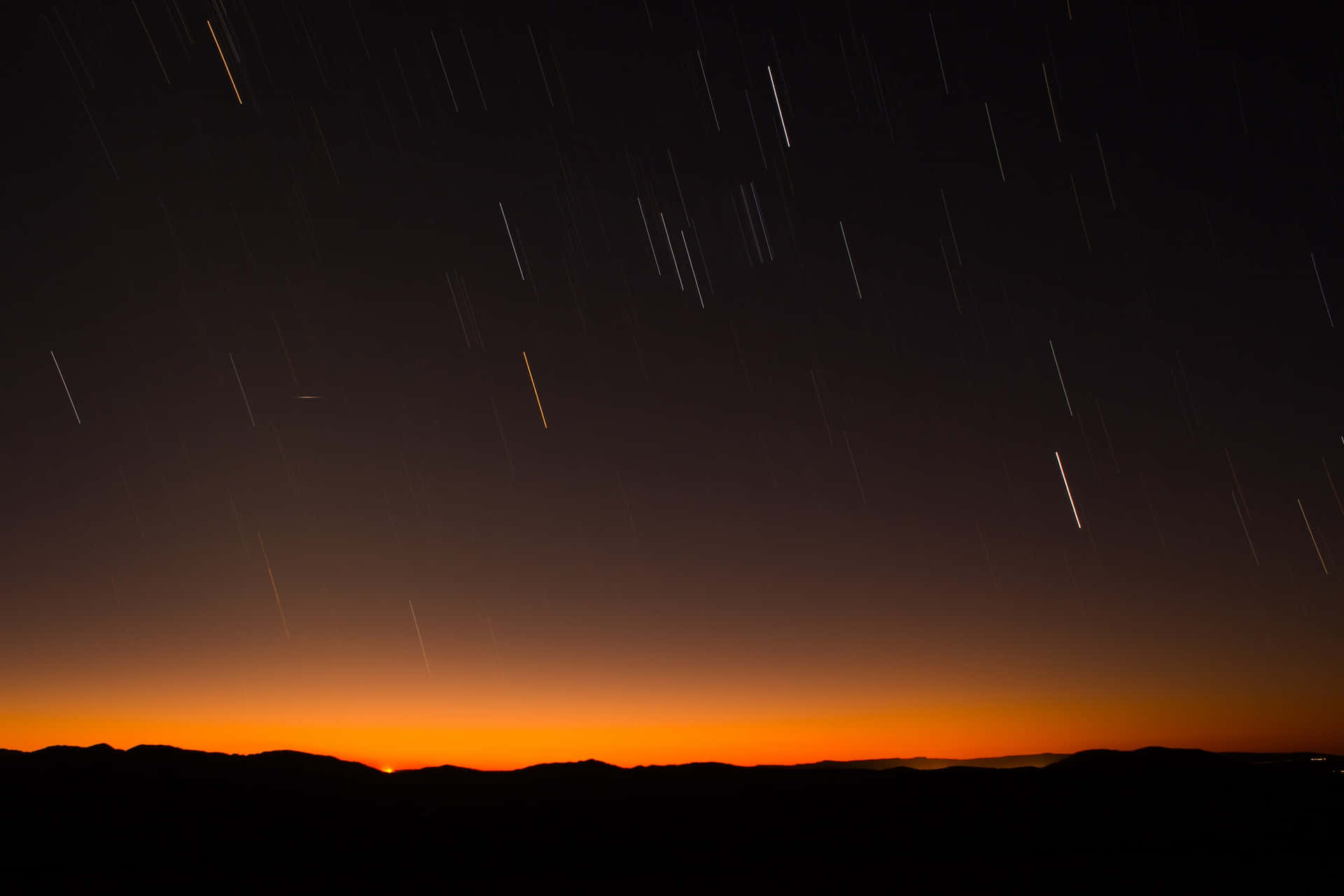 Meteor Shower In The Night Sky