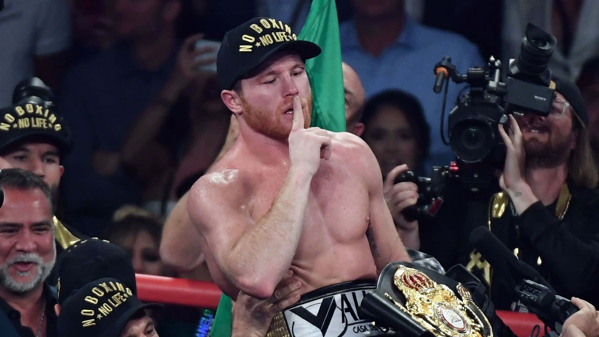 Mexican Boxing Champion Saul Canelo Alvarez Indicating Silence Background
