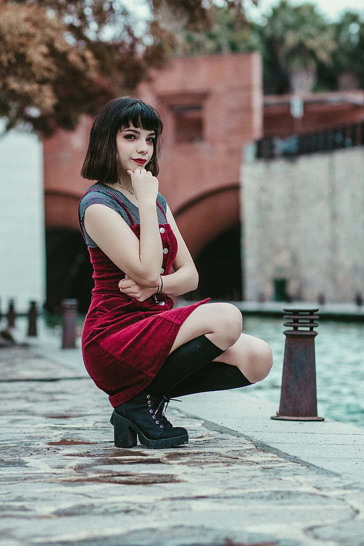 Mexican Woman With A Bob-cut Hairstyle Background