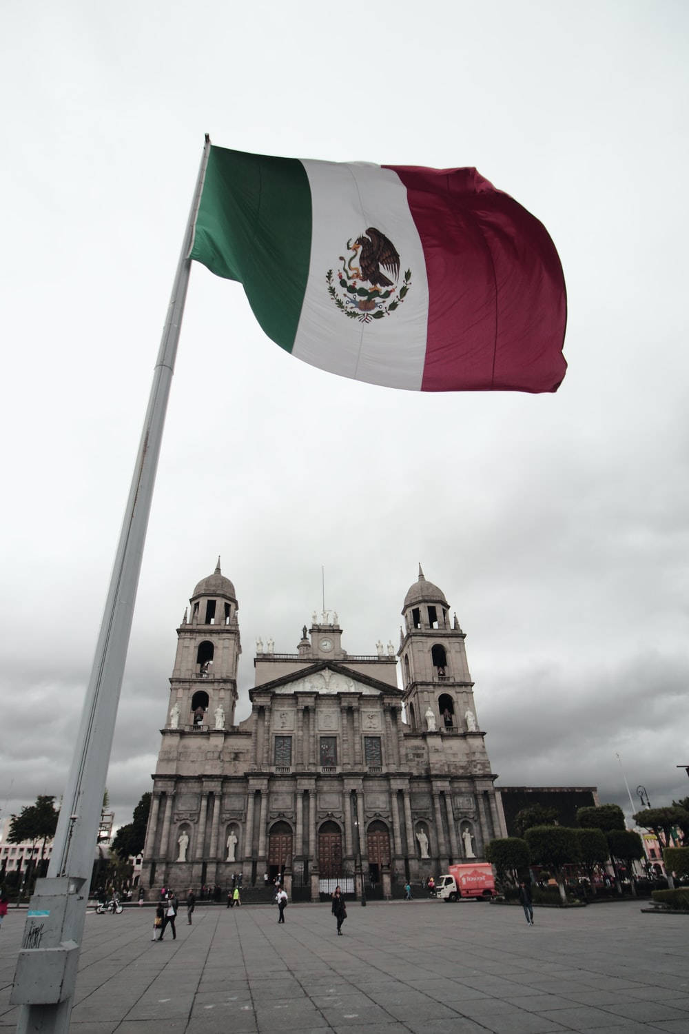 Mexico Flag In Front Of Church Background